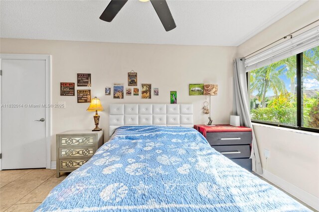 17130 SW 93rd Ave, Palmetto Bay, FL 33157 - bedroom with a ceiling fan and tile patterned floors