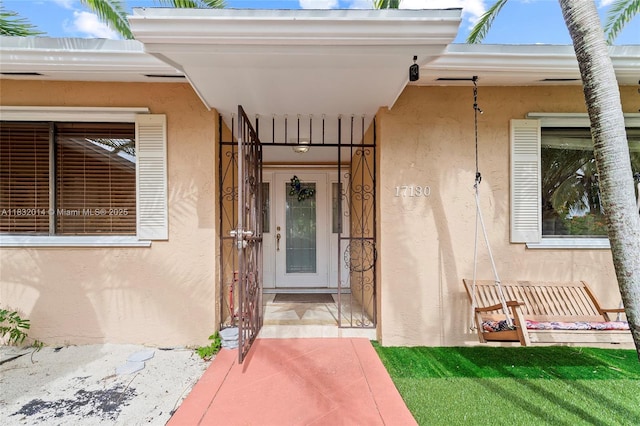 17130 SW 93rd Ave, Palmetto Bay, FL 33157 - view of exterior entry featuring stucco siding