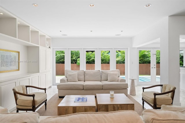 1231 96th St, Bay Harbor Islands, FL 33154 - living area featuring healthy amount of natural light, french doors, and recessed lighting