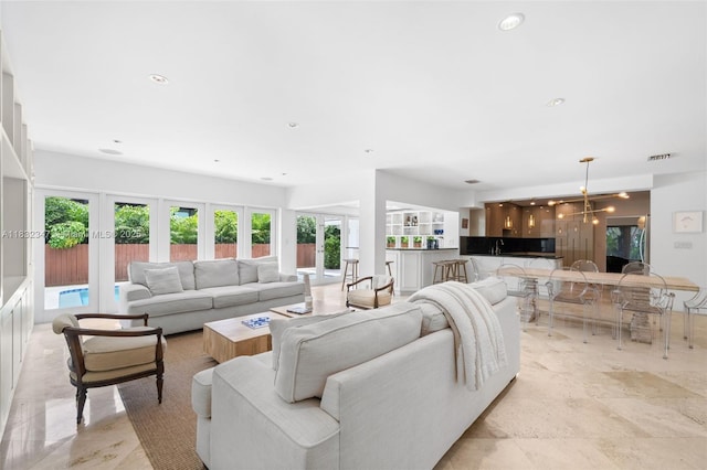 1231 96th St, Bay Harbor Islands, FL 33154 - living room with french doors and recessed lighting