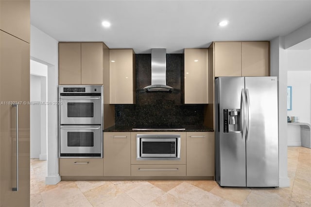 1231 96th St, Bay Harbor Islands, FL 33154 - kitchen featuring stainless steel appliances, wall chimney range hood, cream cabinets, tasteful backsplash, and dark stone counters