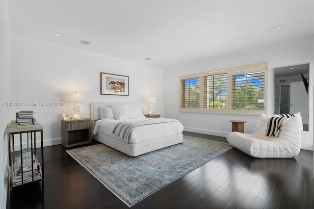 1231 96th St, Bay Harbor Islands, FL 33154 - bedroom with dark wood-type flooring and recessed lighting