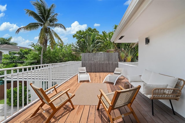 1231 96th St, Bay Harbor Islands, FL 33154 - wooden deck with an outdoor hangout area