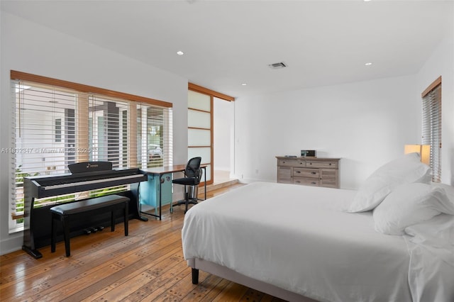1231 96th St, Bay Harbor Islands, FL 33154 - bedroom featuring wood-type flooring and recessed lighting