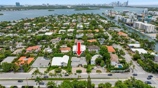 1231 96th St, Bay Harbor Islands, FL 33154 - aerial perspective of suburban area featuring skyline and a nearby body of water