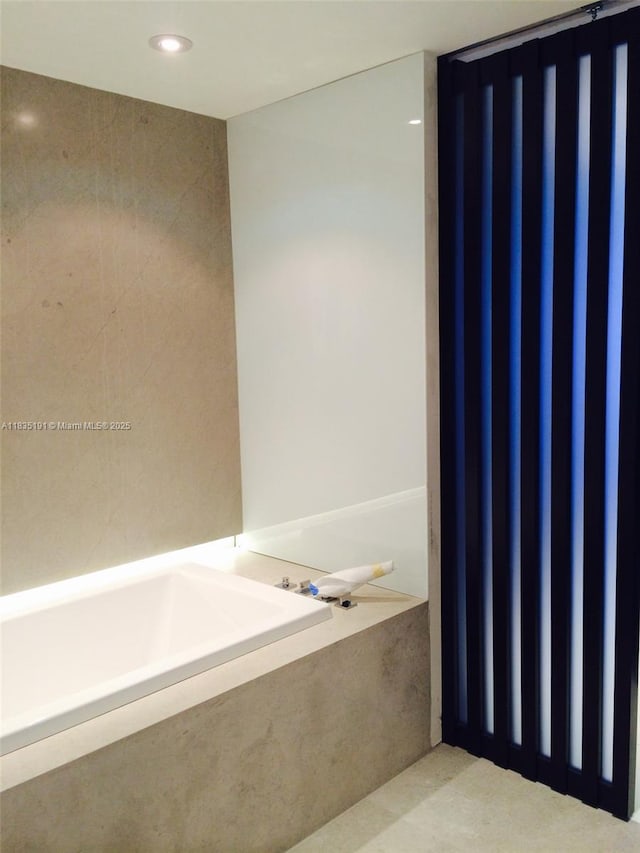 17121 Collins Ave Unit 2803, Sunny Isles Beach, FL 33160 - bathroom with a bath and recessed lighting