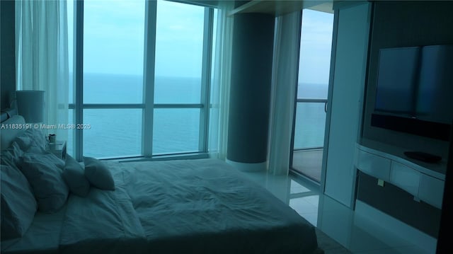 17121 Collins Ave Unit 2803, Sunny Isles Beach, FL 33160 - bedroom featuring light tile patterned floors