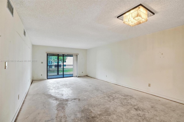 4965 E Sabal Palm Blvd Unit 207, Tamarac, FL 33319 - unfurnished room featuring concrete flooring and a textured ceiling