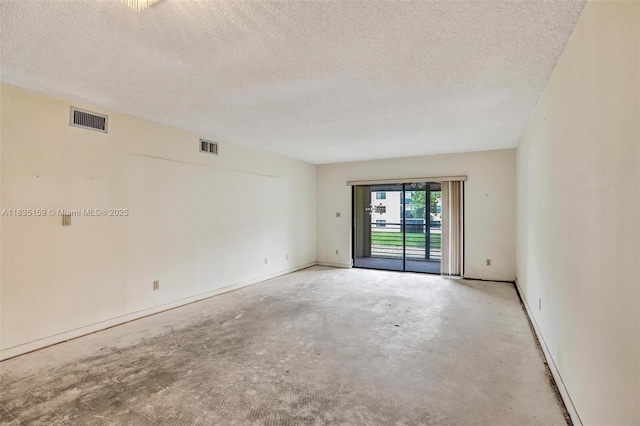 4965 E Sabal Palm Blvd Unit 207, Tamarac, FL 33319 - unfurnished room with concrete flooring and a textured ceiling