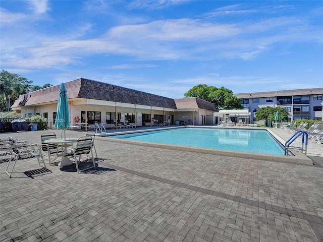 4965 E Sabal Palm Blvd Unit 207, Tamarac, FL 33319 - community pool featuring a patio