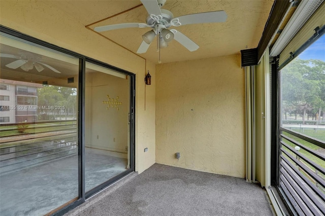 4965 E Sabal Palm Blvd Unit 207, Tamarac, FL 33319 - unfurnished sunroom featuring a ceiling fan