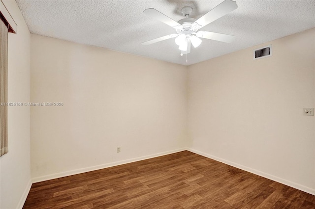 4965 E Sabal Palm Blvd Unit 207, Tamarac, FL 33319 - unfurnished room with wood finished floors, a ceiling fan, and a textured ceiling