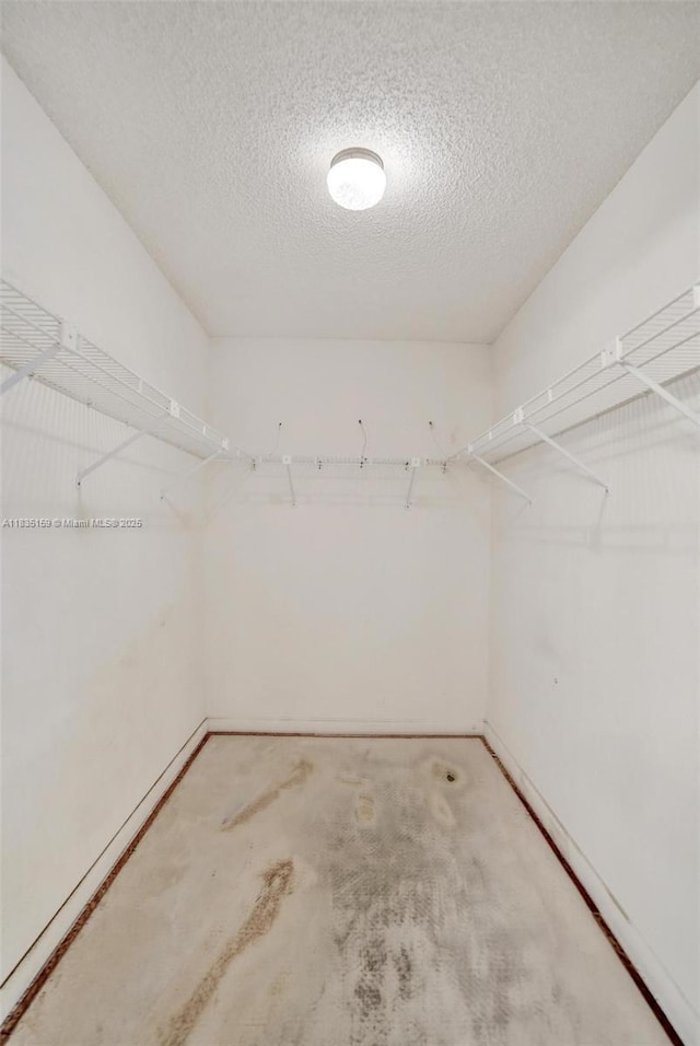 4965 E Sabal Palm Blvd Unit 207, Tamarac, FL 33319 - spacious closet featuring carpet floors