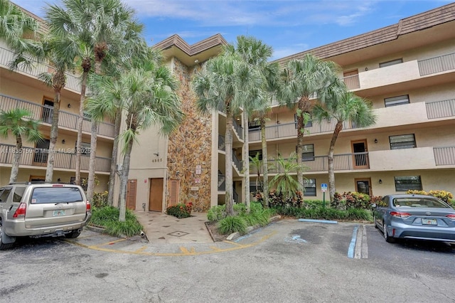 4965 E Sabal Palm Blvd Unit 207, Tamarac, FL 33319 - view of apartment building / complex with uncovered parking