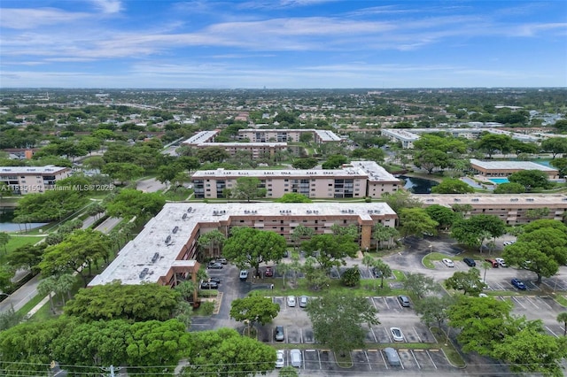4965 E Sabal Palm Blvd Unit 207, Tamarac, FL 33319 - aerial view of property and surrounding area with apartment complex and a nearby body of water