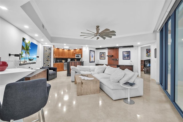 333 Las Olas Way Unit 405, Fort Lauderdale, FL 33301 - living area with recessed lighting, ceiling fan, bar, and a tray ceiling