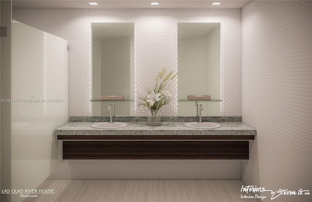 333 Las Olas Way Unit 405, Fort Lauderdale, FL 33301 - bathroom featuring double vanity and wood finished floors