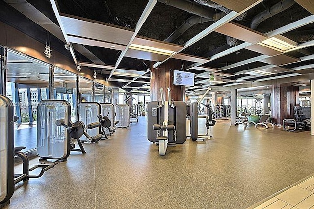 333 Las Olas Way Unit 405, Fort Lauderdale, FL 33301 - workout area featuring wood walls