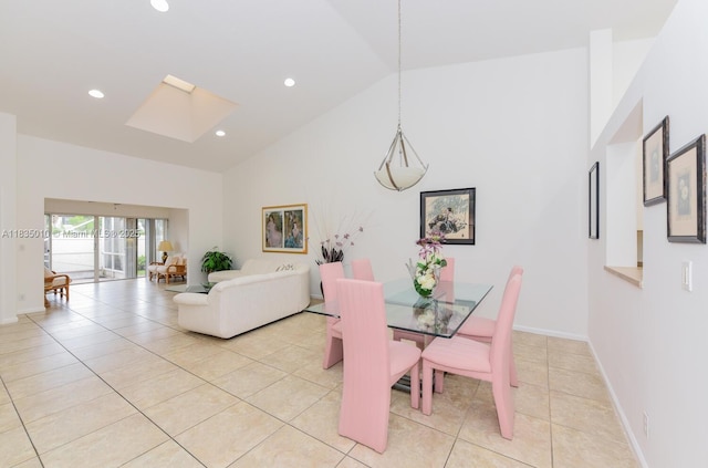 5570 Royal Lake Cir, Boynton Beach, FL 33437 - dining room featuring high vaulted ceiling, light tile patterned floors, a skylight, and recessed lighting