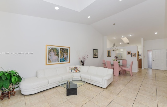 5570 Royal Lake Cir, Boynton Beach, FL 33437 - living area featuring light tile patterned flooring, recessed lighting, a skylight, and high vaulted ceiling