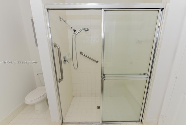 5570 Royal Lake Cir, Boynton Beach, FL 33437 - full bathroom featuring a shower stall and tile patterned flooring