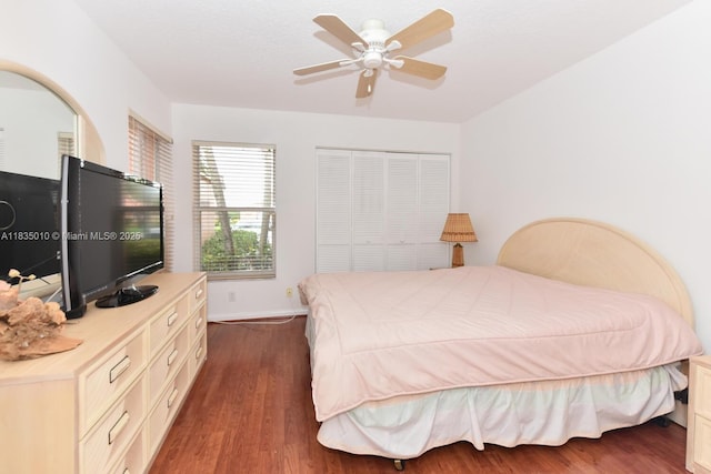5570 Royal Lake Cir, Boynton Beach, FL 33437 - bedroom with dark wood-type flooring and ceiling fan