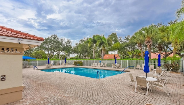 5570 Royal Lake Cir, Boynton Beach, FL 33437 - community pool featuring a patio