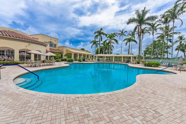 5570 Royal Lake Cir, Boynton Beach, FL 33437 - community pool featuring a patio