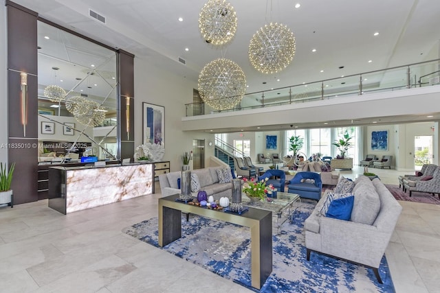 5570 Royal Lake Cir, Boynton Beach, FL 33437 - living area with a high ceiling, a chandelier, and recessed lighting