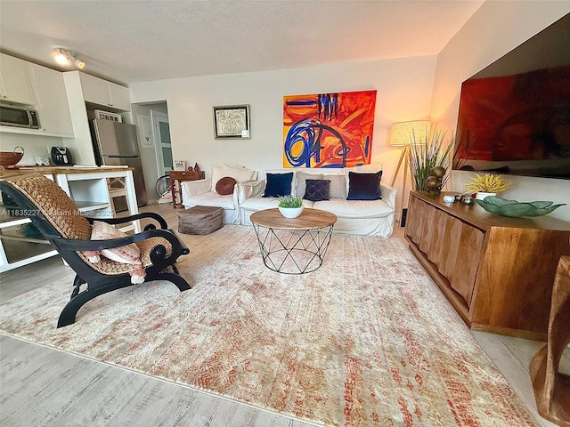 224 Meridian Ave Unit 10, Miami Beach, FL 33139 - living area with wood finished floors