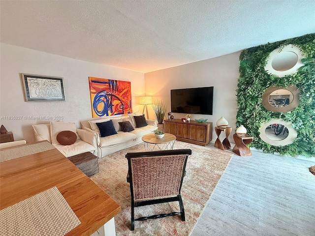 224 Meridian Ave Unit 10, Miami Beach, FL 33139 - living area with a textured ceiling and wood finished floors