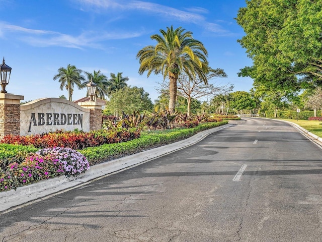 8018 Aberdeen Dr Unit 202, Boynton Beach, FL 33472 - view of asphalt road featuring curbs and street lighting