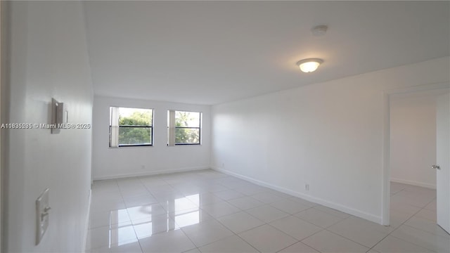 8100 Geneva Ct Unit 343, Doral, FL 33166 - empty room featuring baseboards and light tile patterned flooring