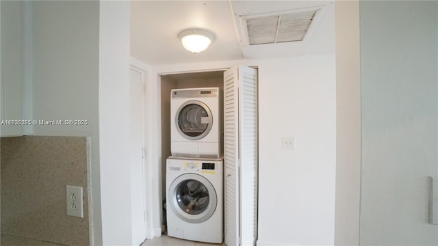 8100 Geneva Ct Unit 343, Doral, FL 33166 - washroom featuring stacked washer / dryer