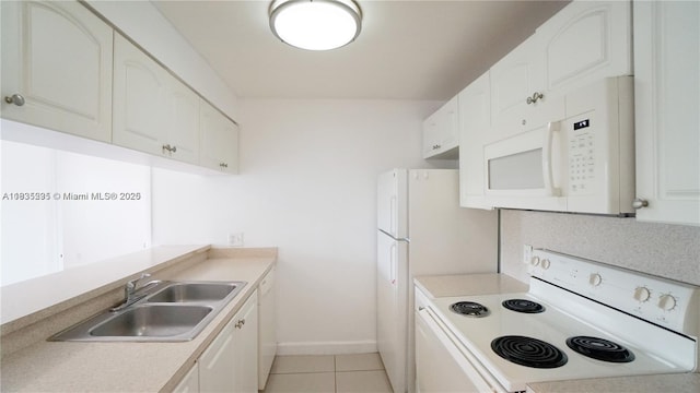 8100 Geneva Ct Unit 343, Doral, FL 33166 - kitchen featuring white appliances, white cabinetry, light countertops, and light tile patterned flooring