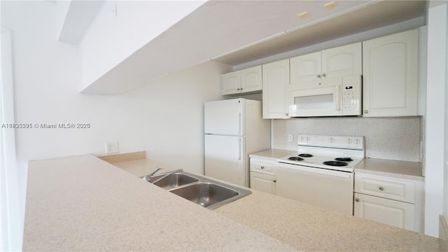 8100 Geneva Ct Unit 343, Doral, FL 33166 - kitchen featuring white appliances, white cabinetry, light countertops, and tasteful backsplash