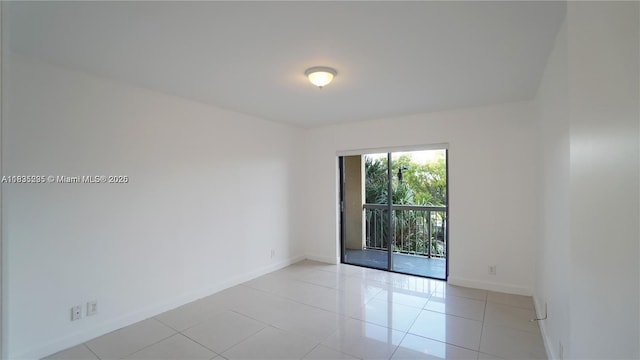 8100 Geneva Ct Unit 343, Doral, FL 33166 - spare room featuring baseboards and light tile patterned flooring