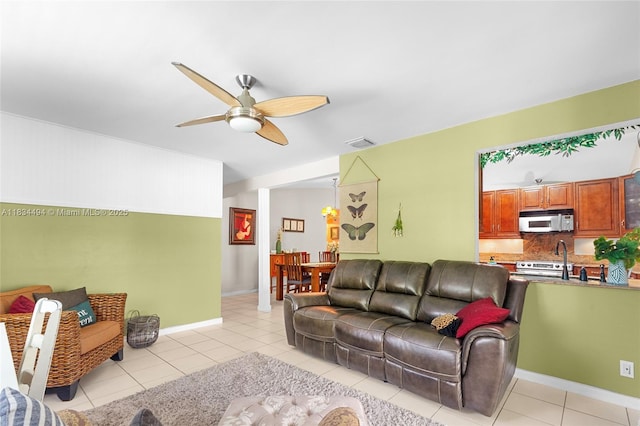 5001 SW 11th Cir, Margate, FL 33068 - living room featuring light tile patterned flooring and ceiling fan