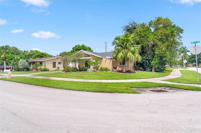 5001 SW 11th Cir, Margate, FL 33068 - view of front of home featuring a front yard and stucco siding