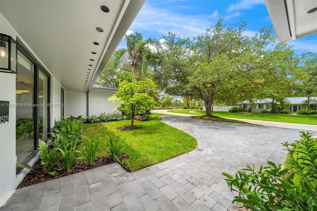 15121 SW 69th Ct, Palmetto Bay, FL 33158 - view of home's community featuring a lawn