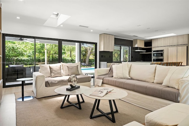 15121 SW 69th Ct, Palmetto Bay, FL 33158 - living room featuring a skylight and recessed lighting
