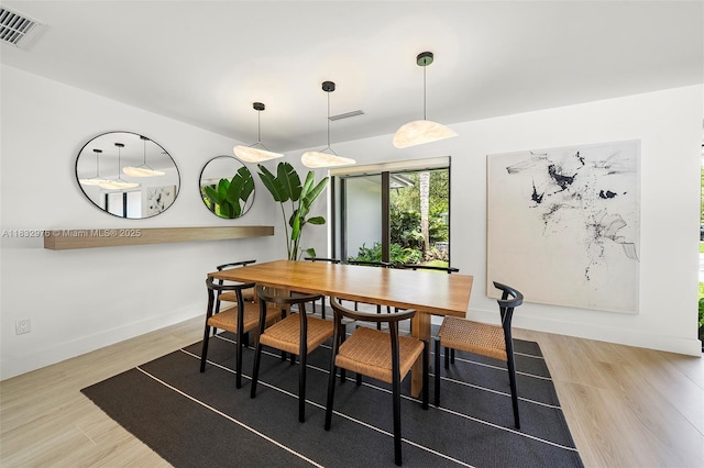 15121 SW 69th Ct, Palmetto Bay, FL 33158 - dining space featuring wood finished floors and baseboards