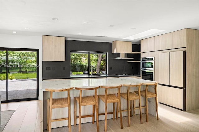 15121 SW 69th Ct, Palmetto Bay, FL 33158 - kitchen featuring refrigerator, modern cabinets, light brown cabinets, and recessed lighting
