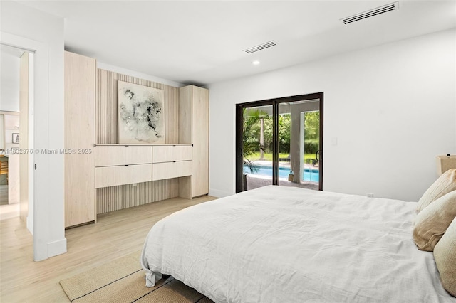 15121 SW 69th Ct, Palmetto Bay, FL 33158 - bedroom featuring access to outside, light wood-style flooring, and recessed lighting