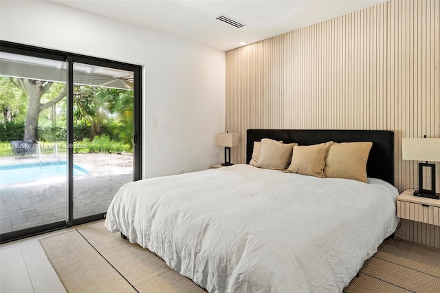 15121 SW 69th Ct, Palmetto Bay, FL 33158 - bedroom with access to exterior and recessed lighting