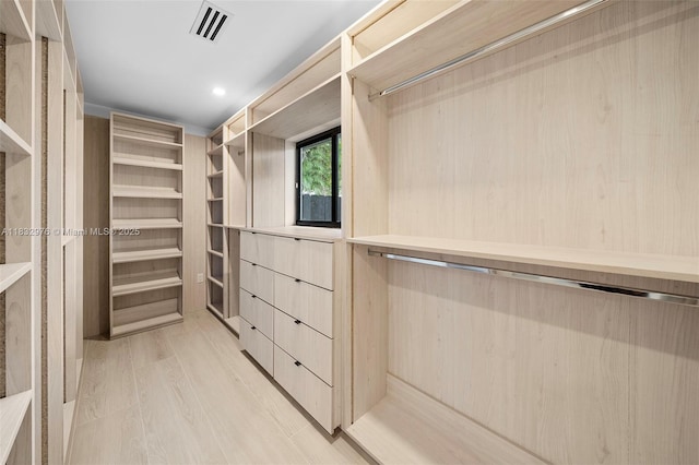 15121 SW 69th Ct, Palmetto Bay, FL 33158 - walk in closet featuring light wood-style flooring