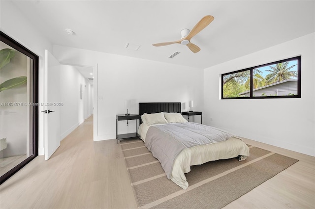 15121 SW 69th Ct, Palmetto Bay, FL 33158 - bedroom featuring light wood-type flooring and a ceiling fan