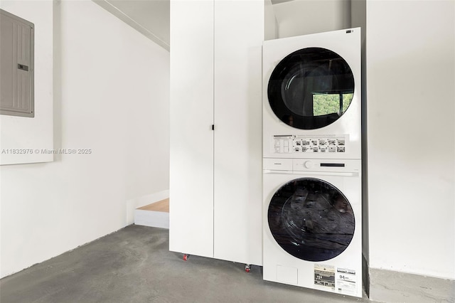 15121 SW 69th Ct, Palmetto Bay, FL 33158 - laundry room featuring stacked washing machine and dryer and electric panel