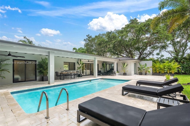 15121 SW 69th Ct, Palmetto Bay, FL 33158 - outdoor pool featuring a ceiling fan, a patio, and outdoor dining space