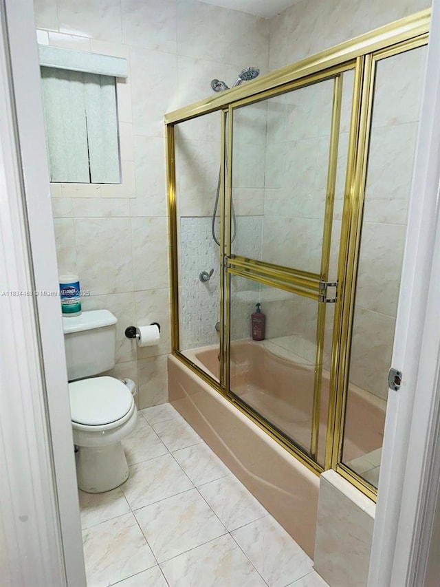 8565 NW 168th Ter, Miami Lakes, FL 33016 - full bath featuring bath / shower combo with glass door and tile walls